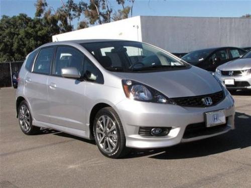 Photo of a 2011-2013 Honda Fit in Alabaster Silver Metallic (paint color code NH700M)