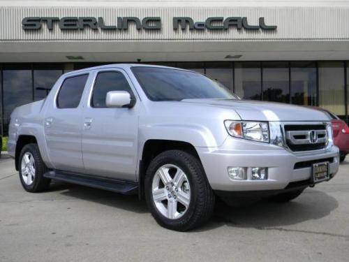 Photo of a 2010-2014 Honda Ridgeline in Alabaster Silver Metallic (paint color code NH700M)