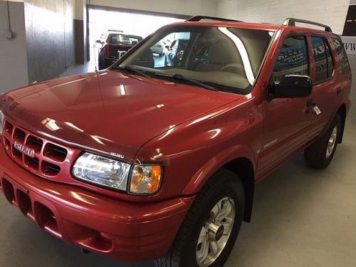 Photo of a 2000 Isuzu Rodeo in Palazzo Red Mica (paint color code 806)