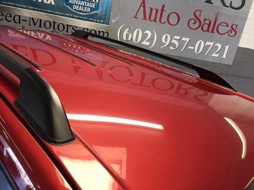 Photo of a 1999-2001 Isuzu Rodeo in Palazzo Red Mica (paint color code 806)