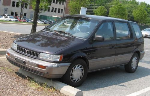 Photo of a 1994 Mitsubishi Expo in Albany Black Pearl on Kensington Gray (paint color code J1H)