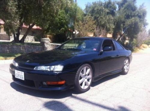 Photo of a 1995-1998 Nissan 240SX in Super Black (paint color code KH3)