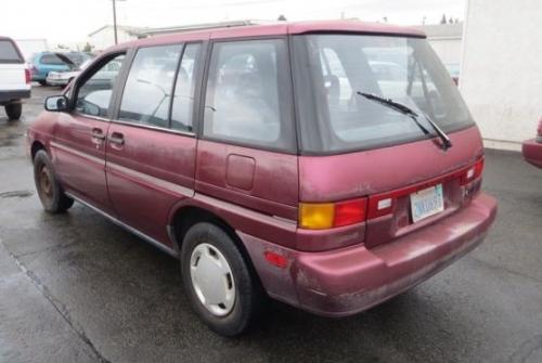 Photo of a 1990 Nissan Axxess in Burgundy Pearl (paint color code AH2)