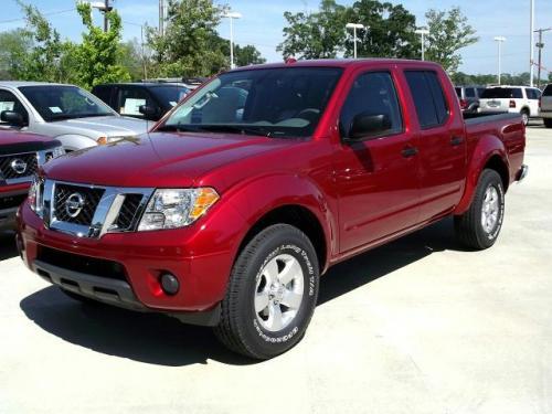 Photo of a 2013-2021 Nissan Frontier in Cayenne Red Metallic (paint color code NAH)