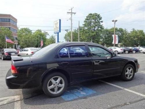 Photo of a 1995-1999 Nissan Maxima in Super Black (paint color code KH3)