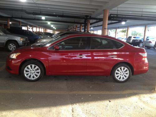 Photo of a 2013-2014 Nissan Sentra in Red Brick (paint color code NAC)