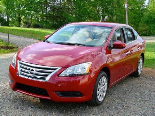 Photo of a 2013-2014 Nissan Sentra in Red Brick (paint color code NAC)