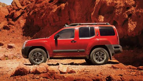 Photo of a 2013-2015 Nissan Xterra in Cayenne Red (paint color code NAH)