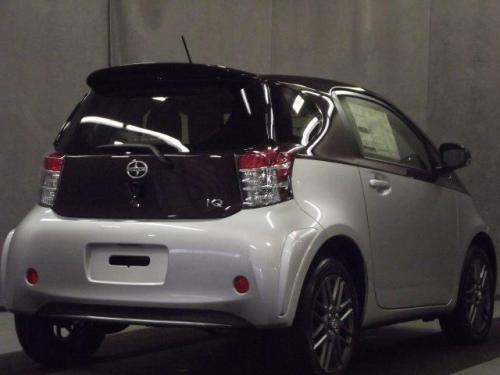 Photo of a 2014 Scion iQ in Black Currant Metallic on Classic Silver Metallic (paint color code 2LT)