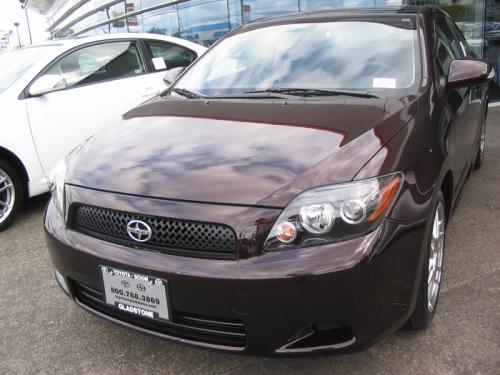 Photo of a 2008-2010 Scion tC in Sizzling Crimson Mica (paint color code 3R0)