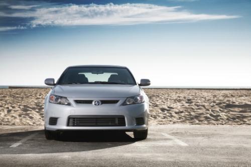 Photo of a 2011-2016 Scion tC in Cement (paint color code 1H5)