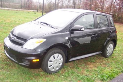 Photo of a 2004-2006 Scion xA in Black Sand Pearl (paint color code 209)