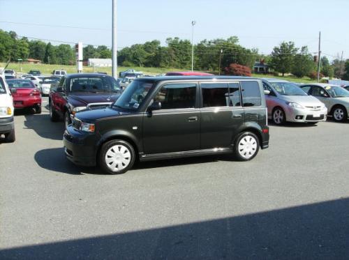 Photo of a 2006 Scion xB in Shadow Mica (paint color code 1F4)