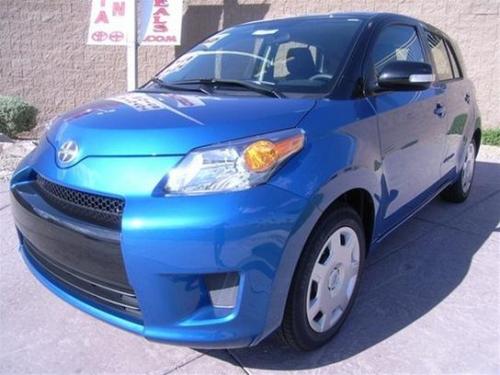 Photo of a 2013 Scion xD in Black Sand Pearl on Blue Streak Metallic (paint color code 2KZ)