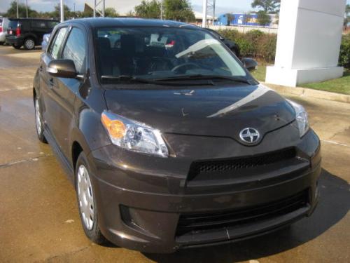 Photo of a 2011 Scion xD in xPresso (paint color code 4T7)