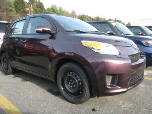 Photo of a 2010-2014 Scion xD in Black Currant Metallic (paint color code 9AH)