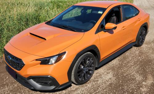 Photo of a 2022-2024 Subaru WRX in Solar Orange Pearl (paint color code WCL)