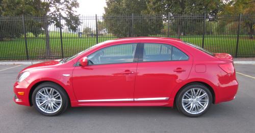 Photo of a 2010-2013 Suzuki Kizashi in Vivid Red (AKA Solid Red) (paint color code ZNB)