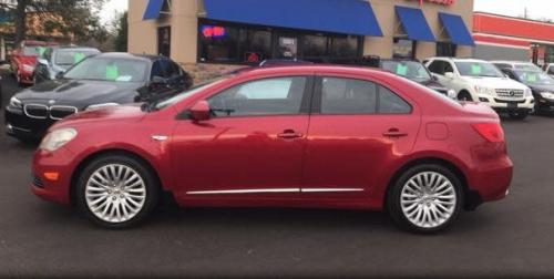 Photo of a 2012-2013 Suzuki Kizashi in Crimson Red Metallic (AKA Ablaze Red) (paint color code ZRJ)