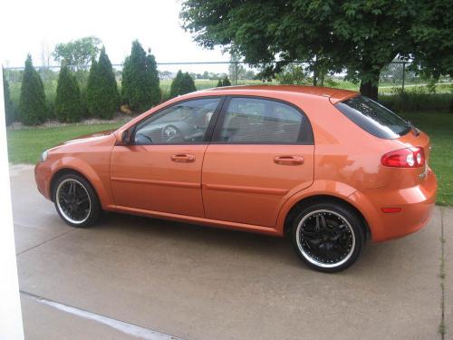 Photo of a 2005-2008 Suzuki Reno in Sunburst Metallic (paint color code 54U)