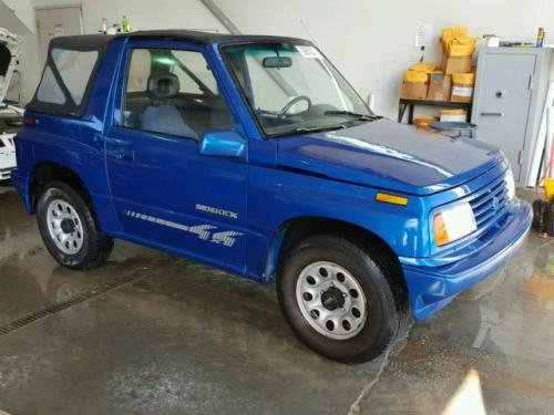 Photo of a 1994 Suzuki Sidekick in Quasar Blue Metallic (paint color code 0SH)