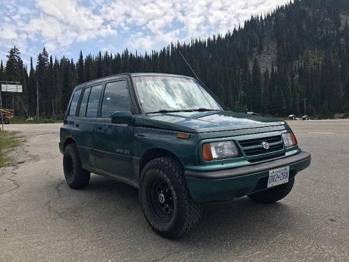 Photo of a 1996-1998 Suzuki Sidekick in Jade Green Metallic (paint color code Y34)