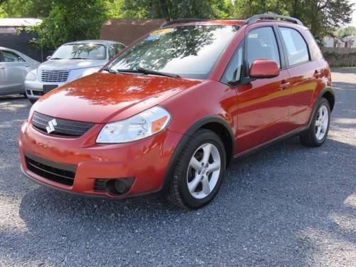 Photo of a 2007-2013 Suzuki SX-4 in Sunlight Copper Metallic (paint color code ZFM)