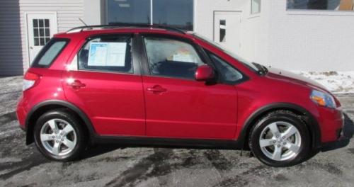 Photo of a 2012-2013 Suzuki SX-4 in Crimson Red Metallic (AKA Ablaze Red Metallic) (paint color code ZRJ)