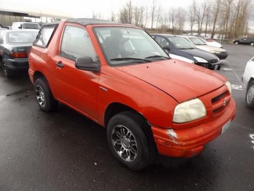 Photo of a 1999-2004 Suzuki Vitara in Victory Red (paint color code Z07)