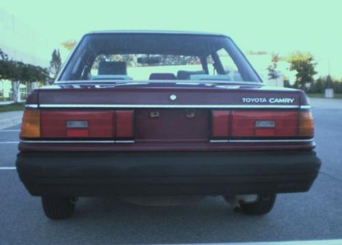 Photo of a 1985-1986 Toyota Camry in Dark Red (paint color code 3F1)