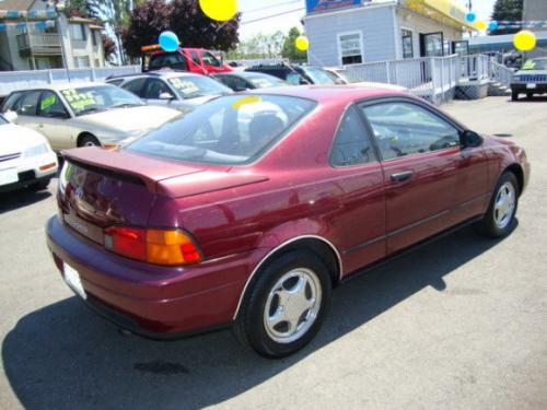 Photo of a 1995 Toyota Paseo in Ruby Pearl (paint color code 3L3)