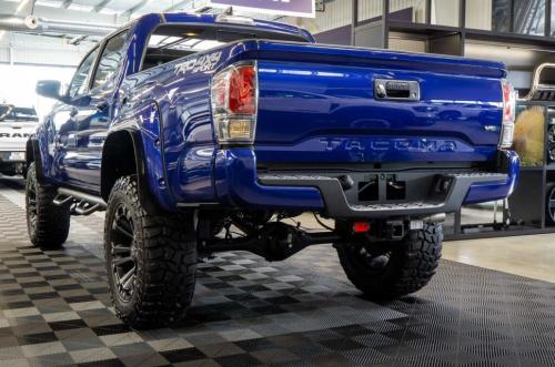 Photo of a 2022-2023 Toyota Tacoma in Blue Crush Metallic (paint color code 8W7)